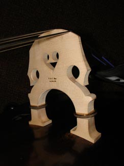 Bridge with brass adjustment